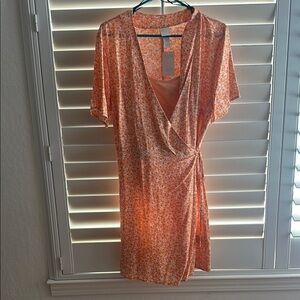 NWT H&M tangerine floral wrap dress.  Size large.